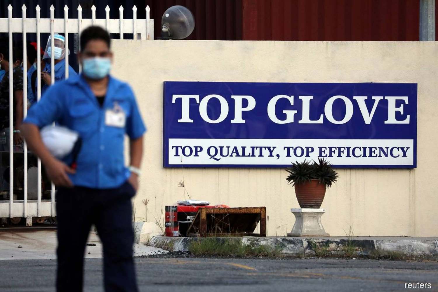 MIDF Research cuts Top Glove target price to RM8.29, saying major worker welfare improvements will take time
